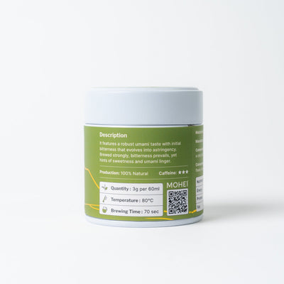 The back of a green and white labeled Matcha powder tin can shows nutrition facts, a description, and brewing guidelines.